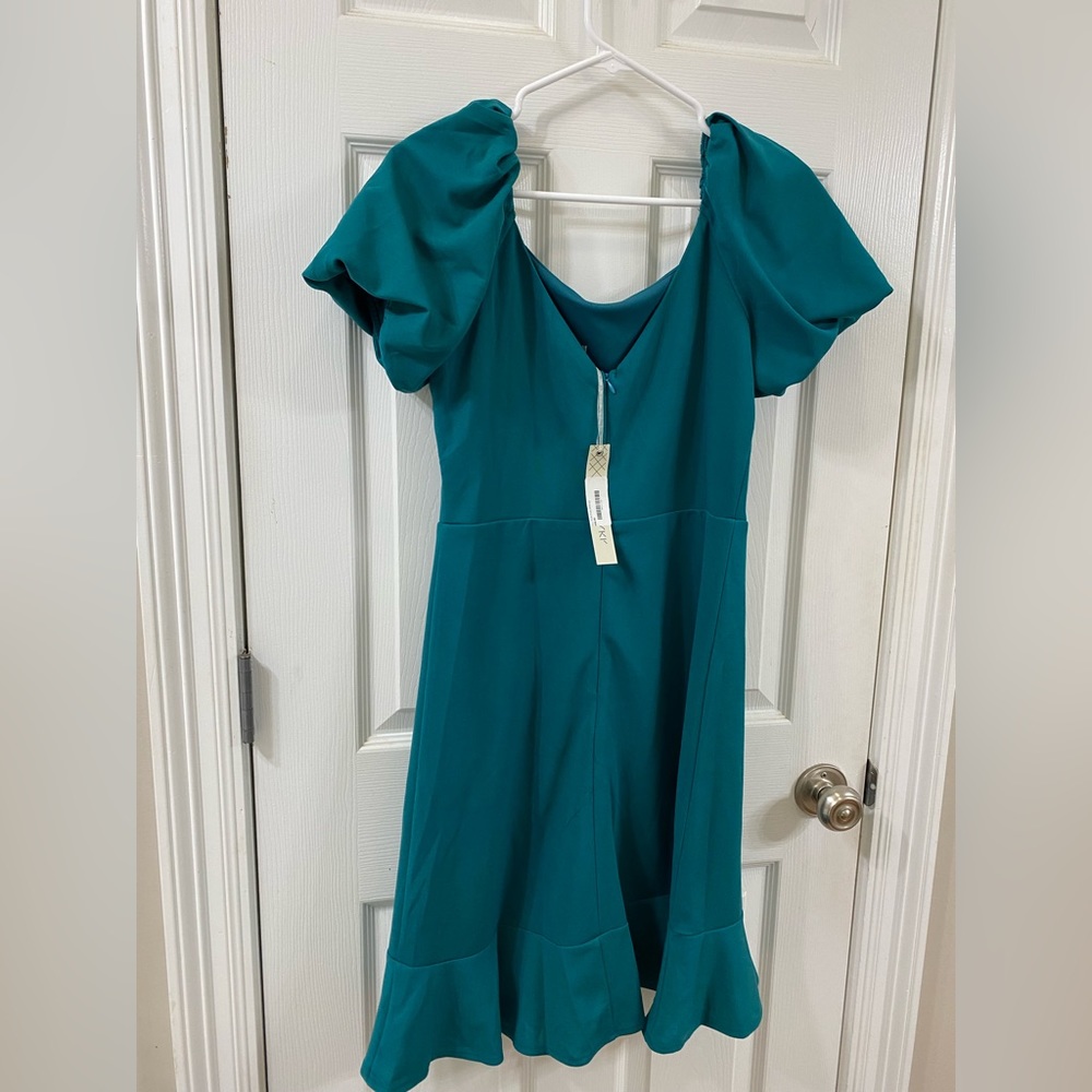 Precious, green dress.  Size medium.  With tags.